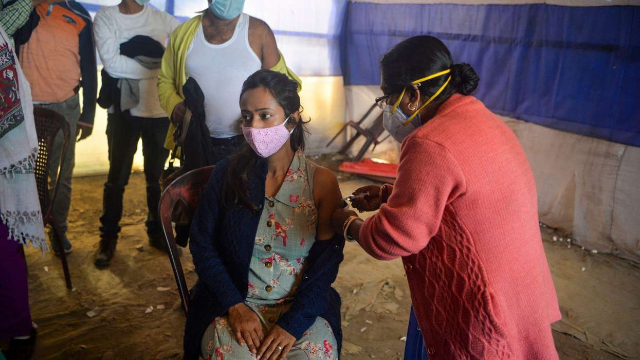 India begins booster campaign as Omicron cases soar