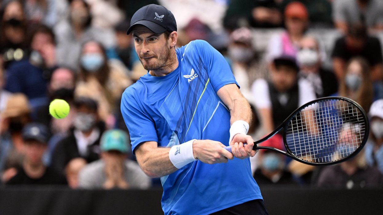Murray wins five-set epic on return to Australian Open