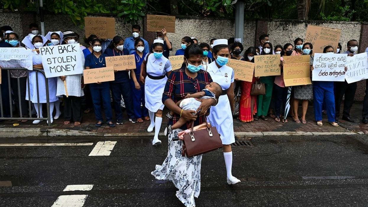 Sri Lanka says IMF to consider request for rapid aid