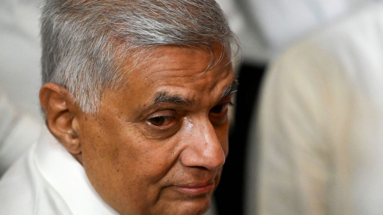 Sri Lanka's new prime minister struggles to form united government