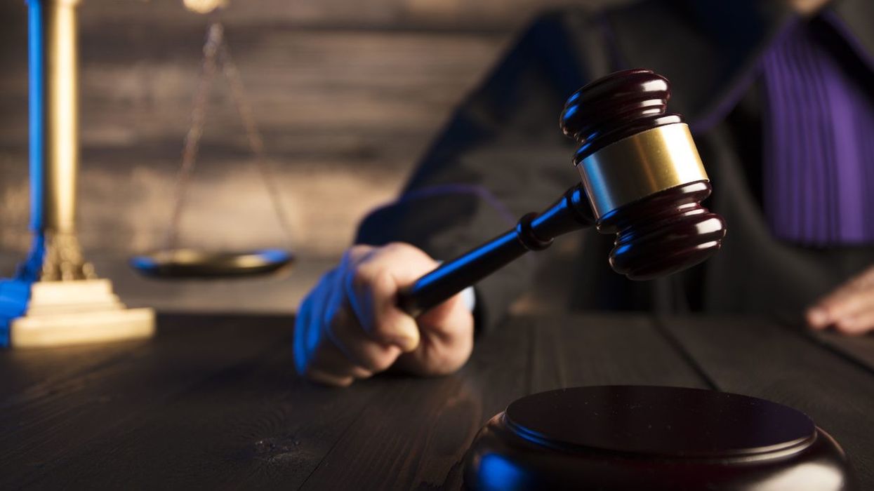 Jailed hate preacher's son wants UK terror trial