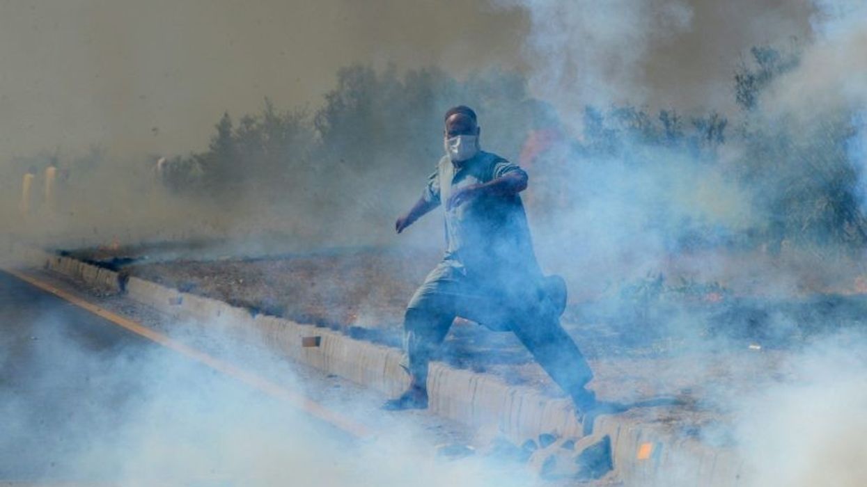 Imran Khan's supporters were carrying automatic weapons at Azadi rally, says Pak defence minister