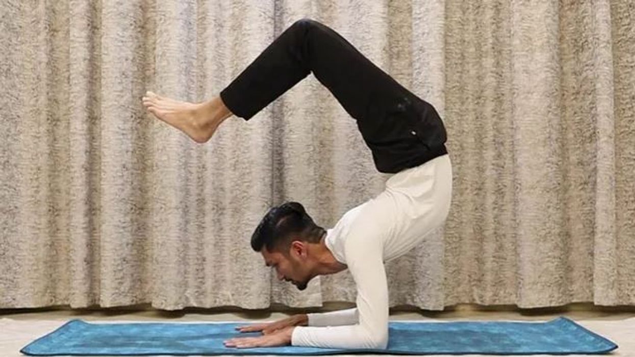 Watch: Indian man holds scorpion pose for 29 minutes, creates world record