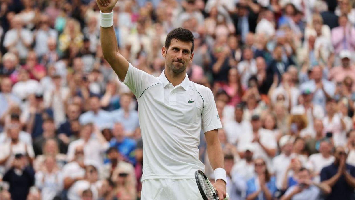 Djokovic drops set on way into Wimbledon second round