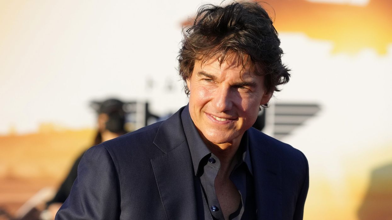 Tom Cruise apologises for interrupting a UK couple’s hike before jumping off a cliff screaming, ‘see you later, folks’