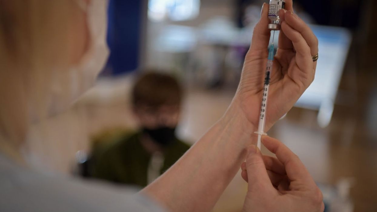 UK becomes first country to approve COVID booster vaccine targeting original and Omicron strains