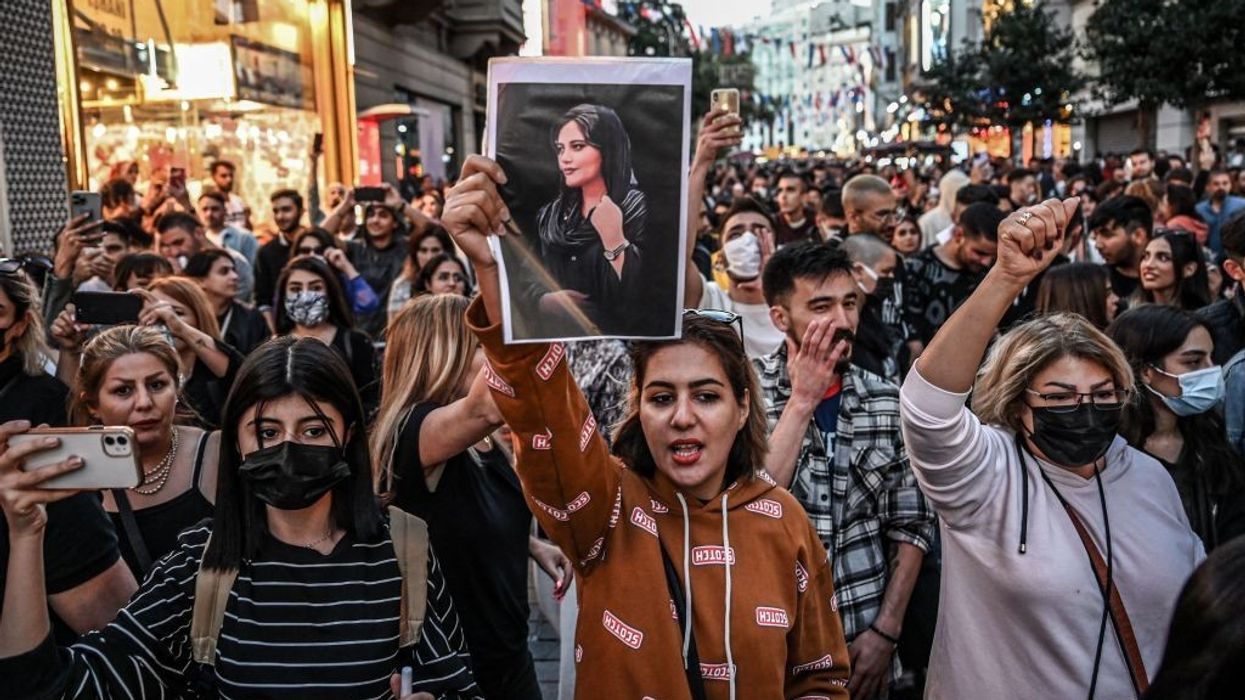 Six reported killed as Iran protests spread over woman's death