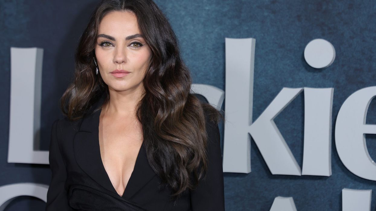 Mila Kunis says 'not standing up' at Oscars was a 'no-brainer' following Will Smith's slap