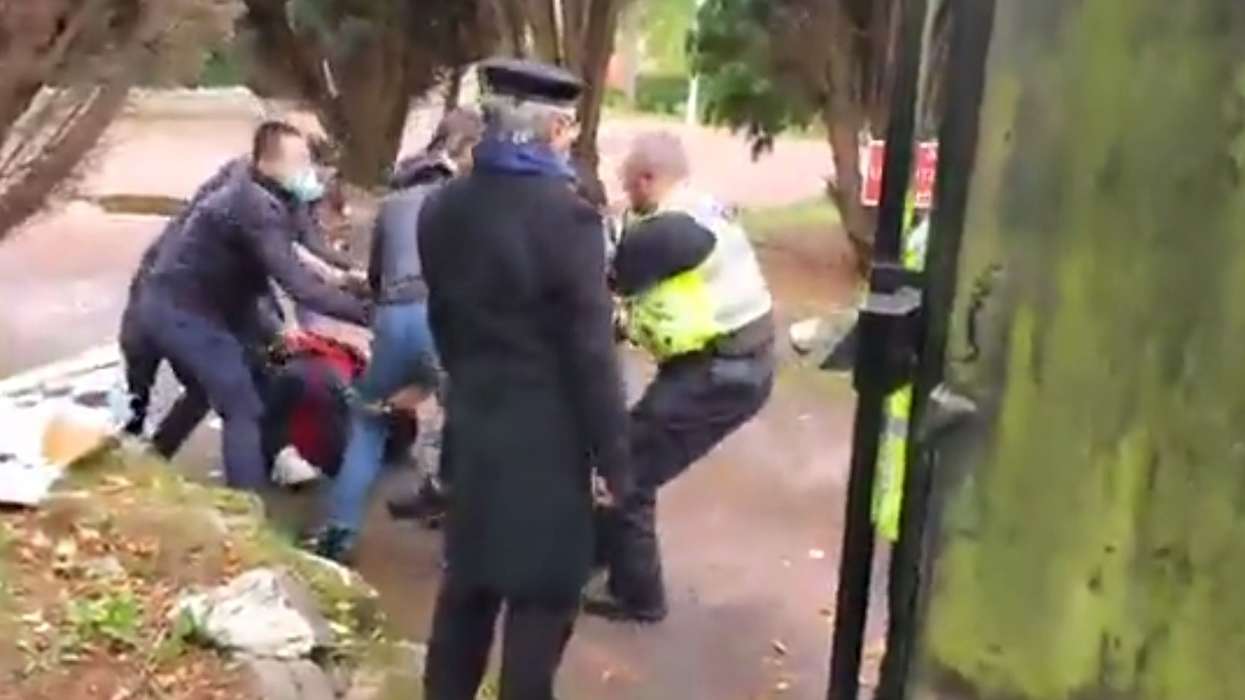 Police investigate beating of protester on China consulate grounds in UK