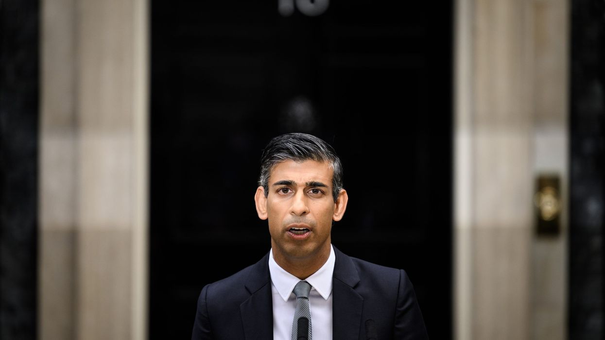 'New dawn' for UK, 'Death of Democracy': Britain's new PM Sunak witnesses both bricks and bouquets