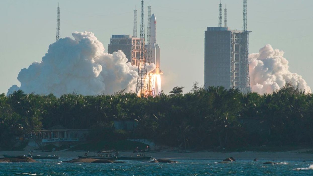 China to launch three astronauts for its space station; unveils plans for manned Moon mission
