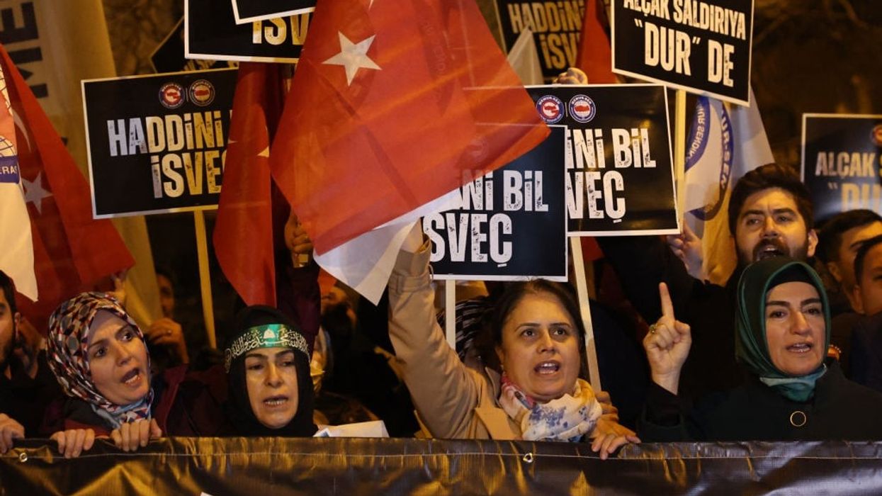 Protests in Stockholm, including Koran-burning, draw strong condemnation from Turkey