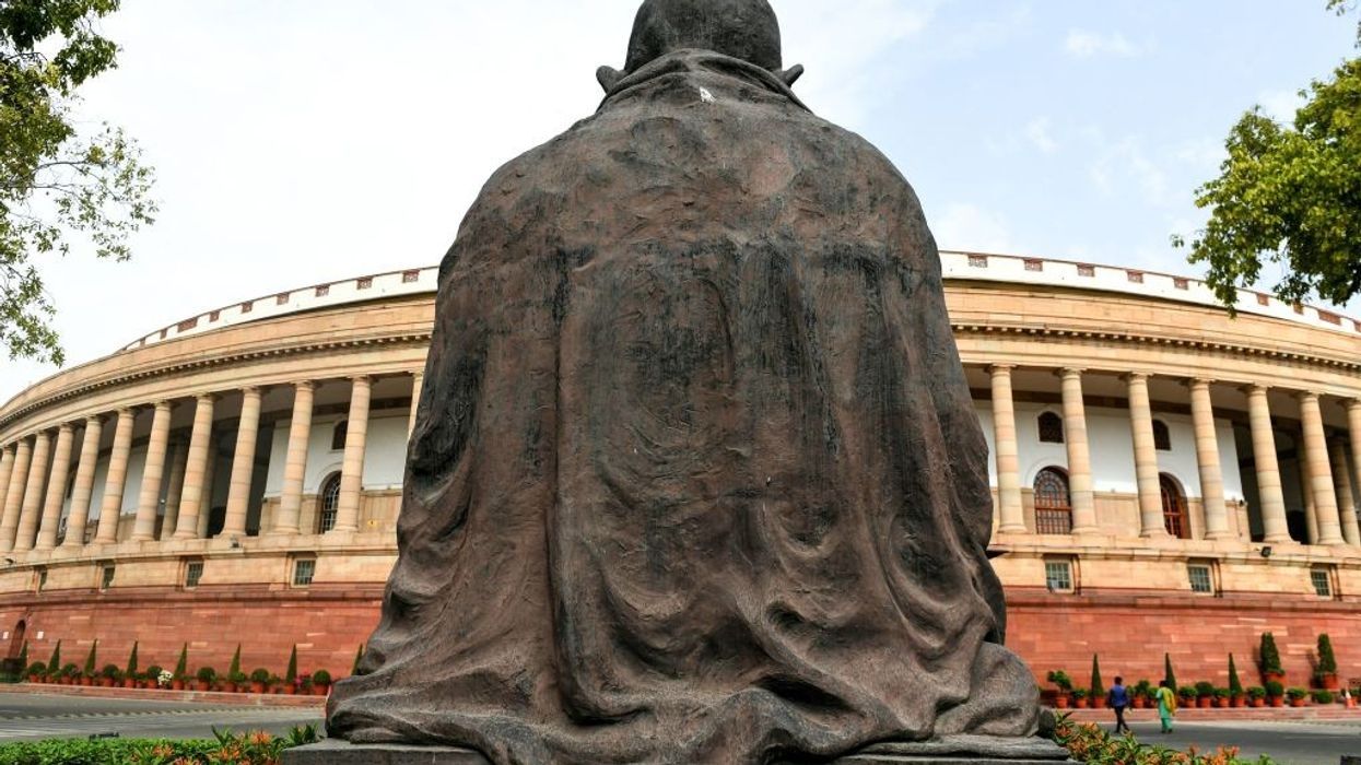 Indian opposition lawmakers shout anti-Adani slogans in parliament