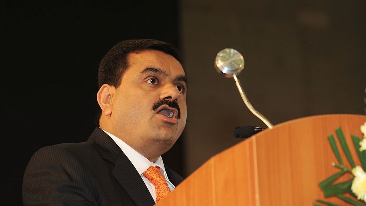 Adani group firms pledge additional shares for key lender
