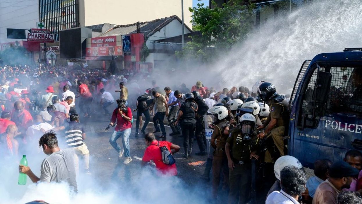 Sri Lanka outlaws strikes as anti-tax protests spread