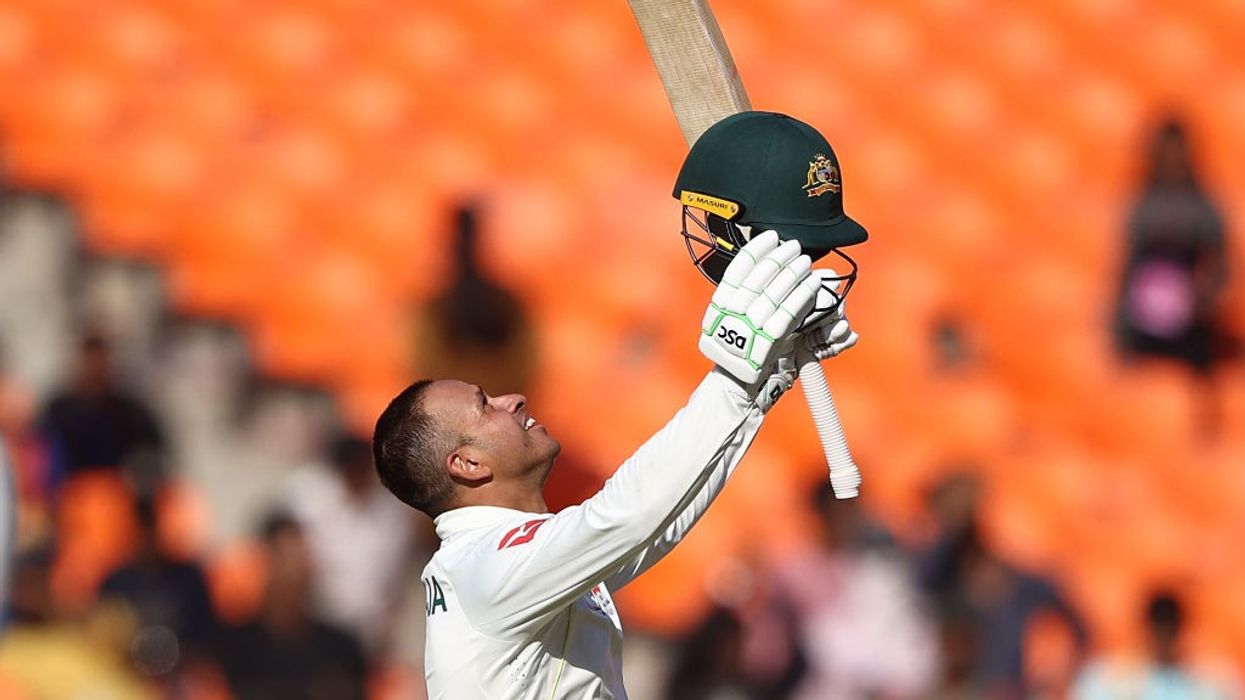Khawaja's century powers Australia to 255-4 against India