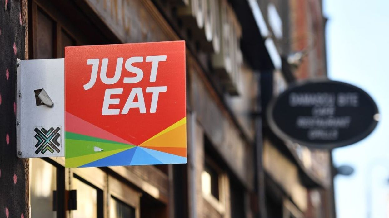 Just Eat to axe 1,700 jobs to cut costs