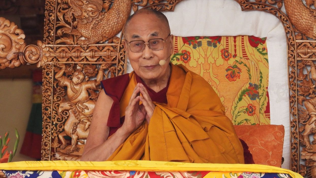 Dalai Lama apologises for inappropriate behaviour with minor