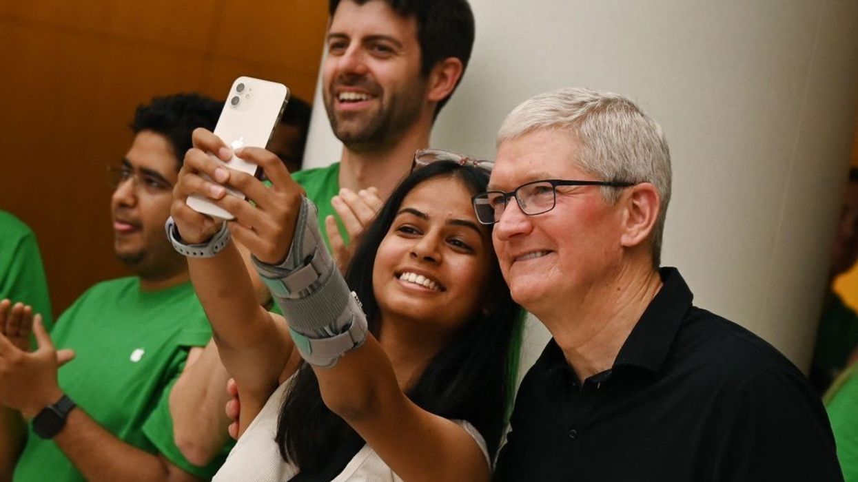 Apple CEO Tim Cook meets Modi, commits to investment in India