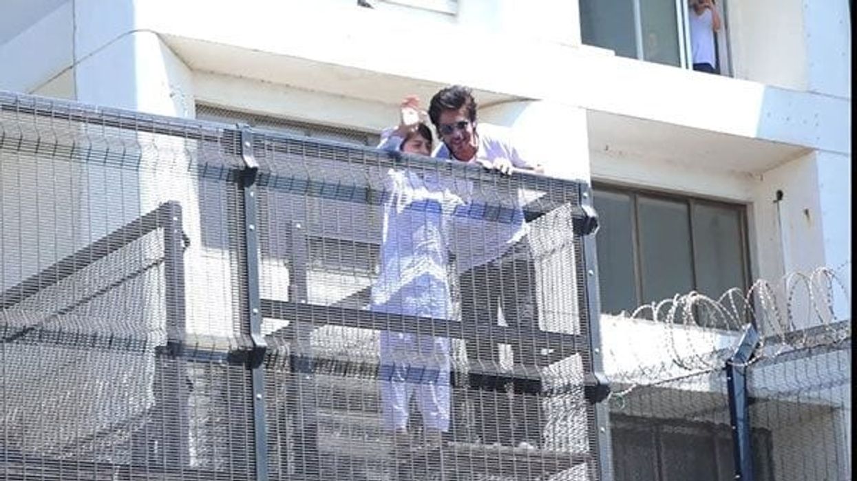 Shah Rukh Khan greets fans outside Mannat on Eid, little Abram joins him
