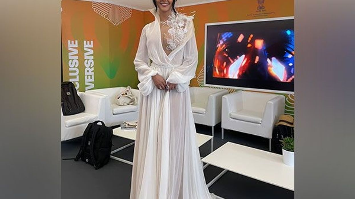 Cannes 2023: Esha Gupta stuns in white thigh-high slit gown