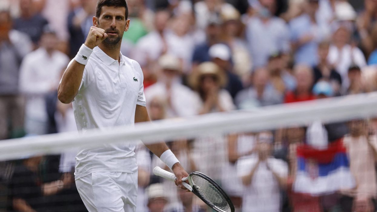 Wimbledon 2023: Djokovic and Swiatek cruise to victories as rain delays play