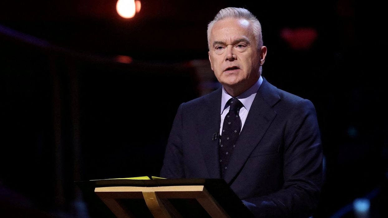 Huw Edwards identified as BBC presenter at centre of sex photo scandal