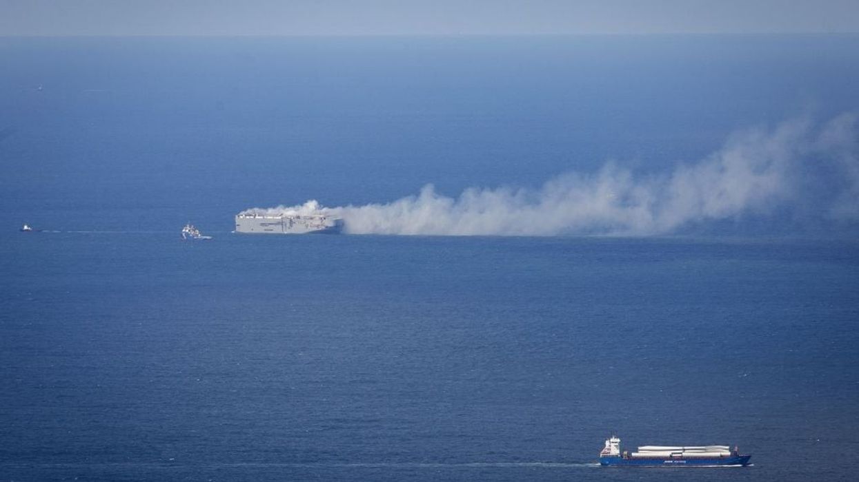 Dutch race to put out blaze on car ship