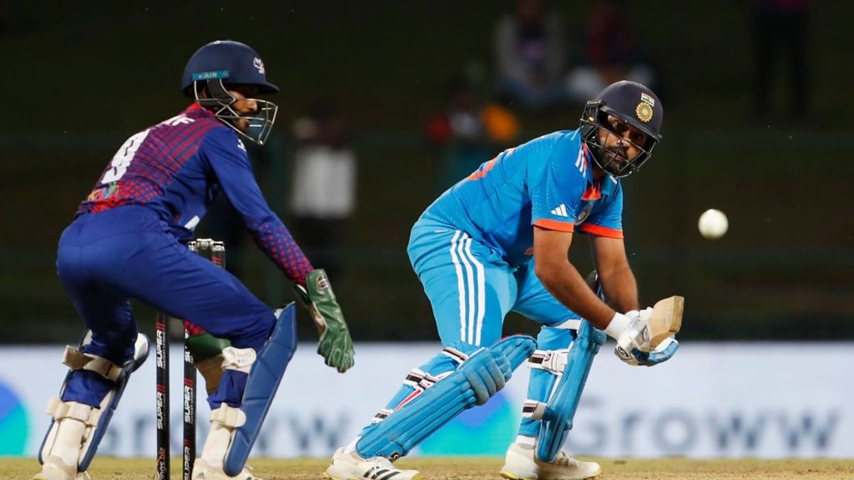 India thrash Nepal to reach Super Fours