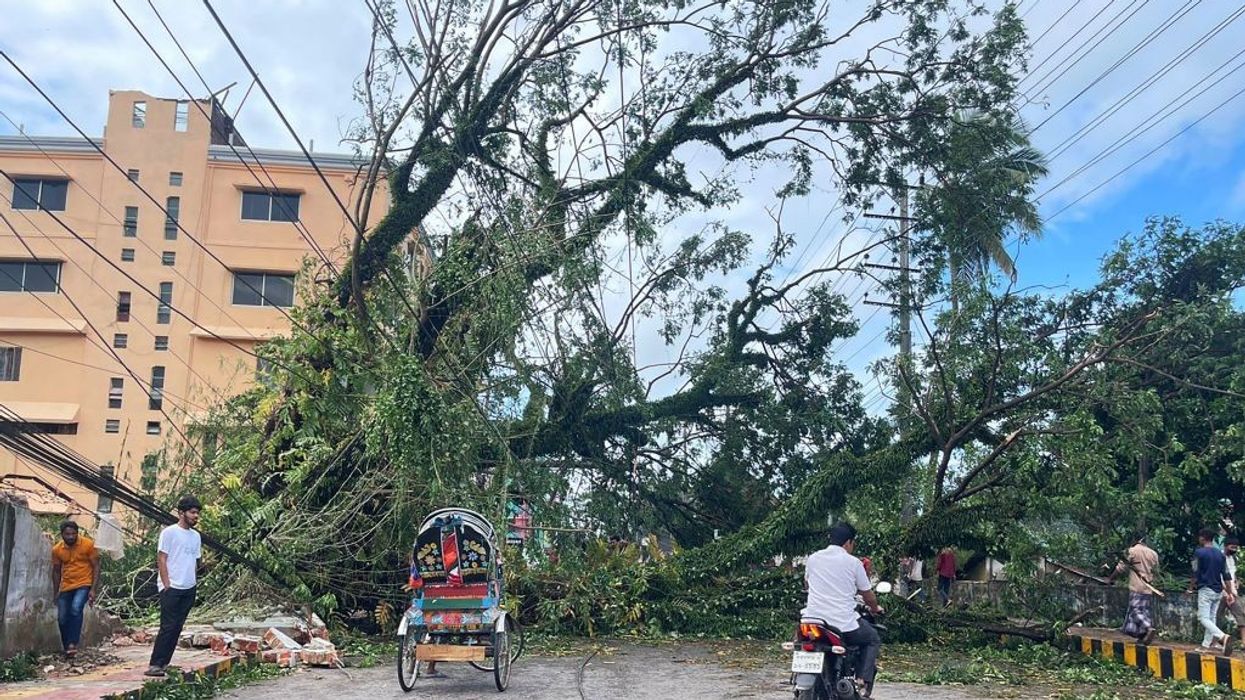 Two killed, nearly 275,000 flee Bangladesh cyclone