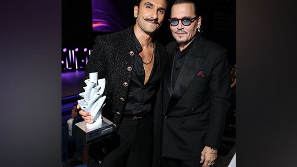 Ranveer poses with Johnny Depp at Red Sea Film Festival