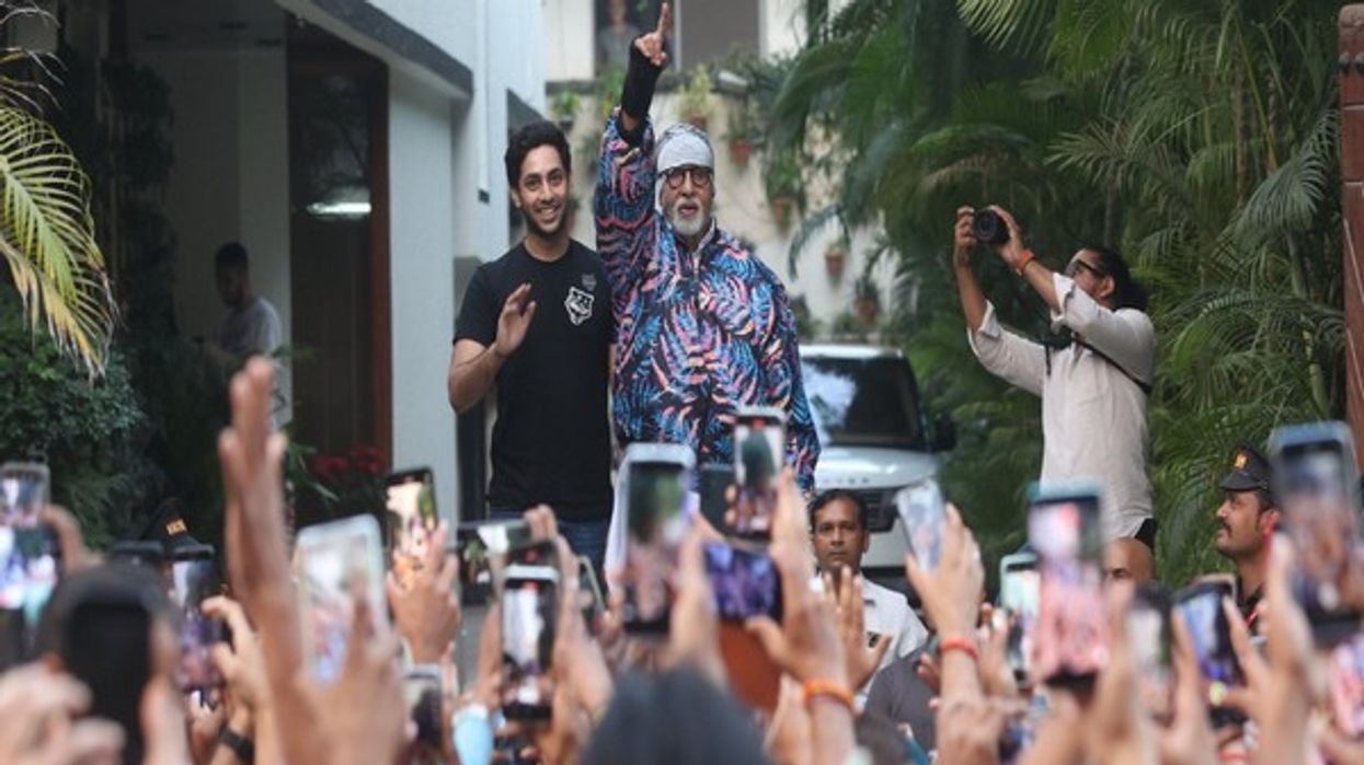 Big B greets fans with grandson Agastya