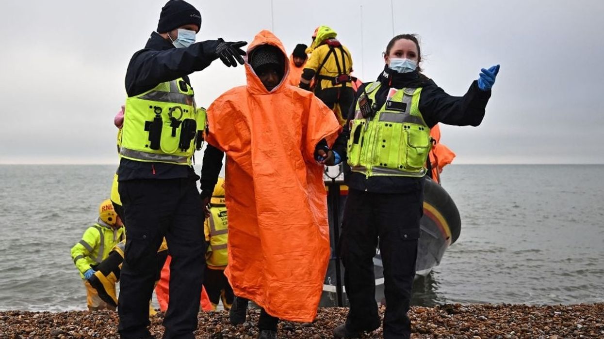 Migrant boat with over 60 capsizes in Channel, one dead