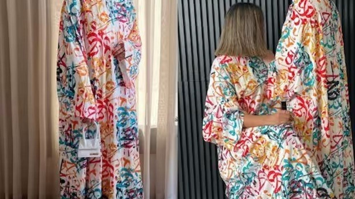Lahore crowd angered by a woman wearing print dress with Arabic words