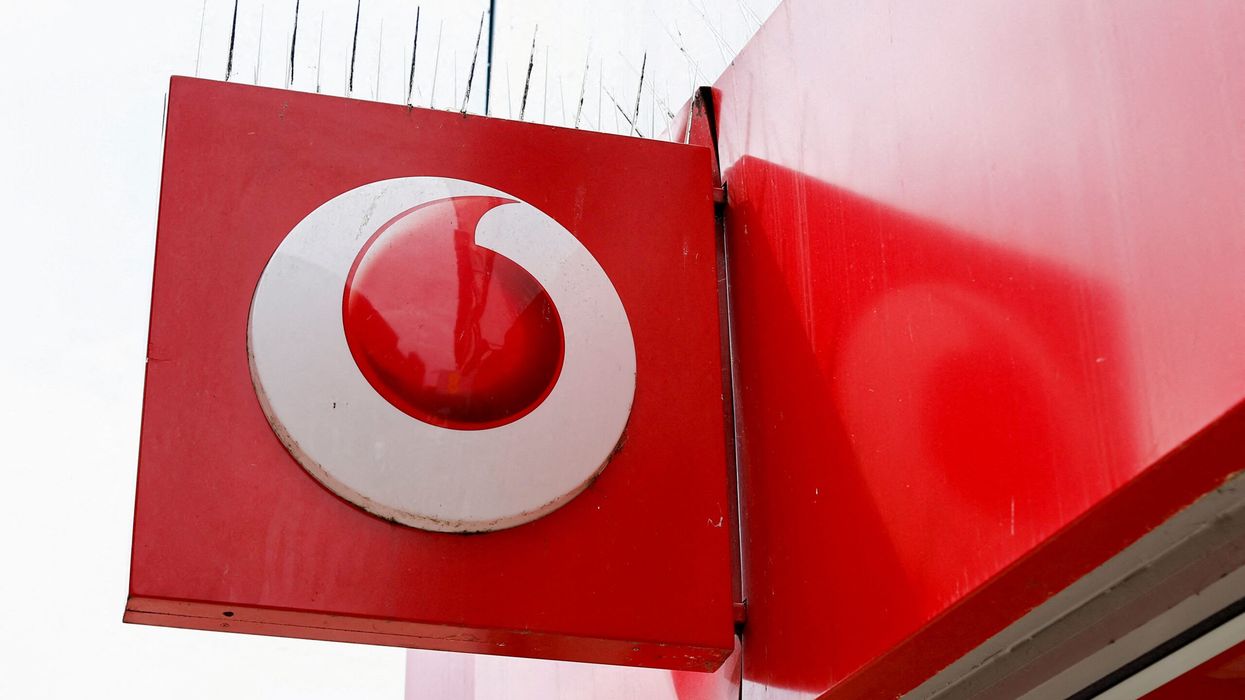Vodafone sells Italian unit to Swisscom