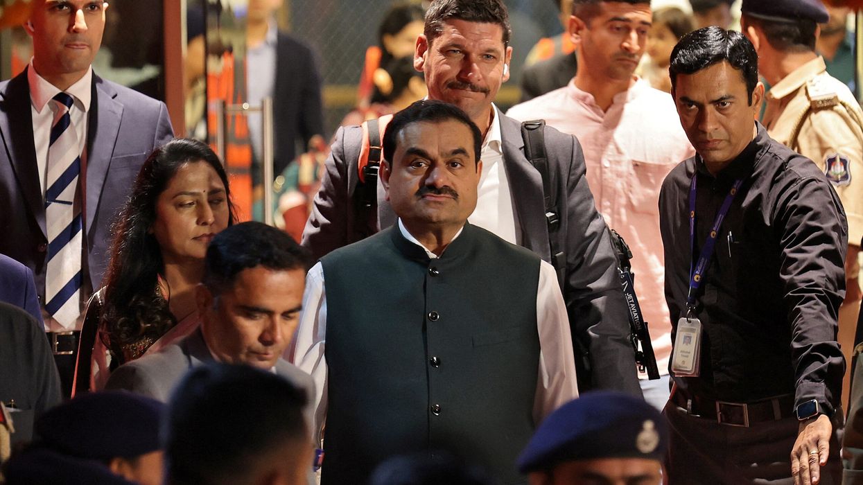 Ambani's Reliance picks up stake in rival Adani firm