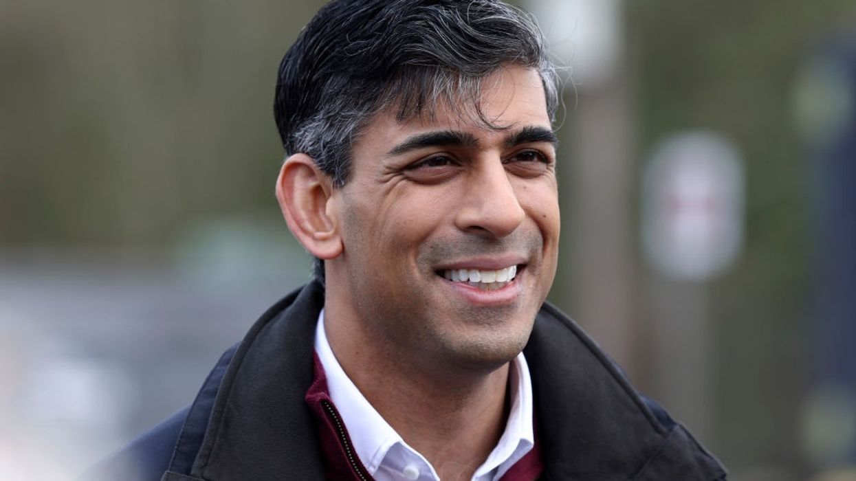 Sunak says 'flight will go' as parliament passes Rwanda asylum law