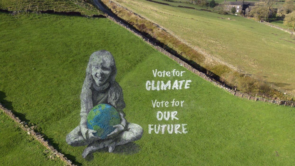 Spray paint art on Hebden Bridge pastures to observe Earth Day
