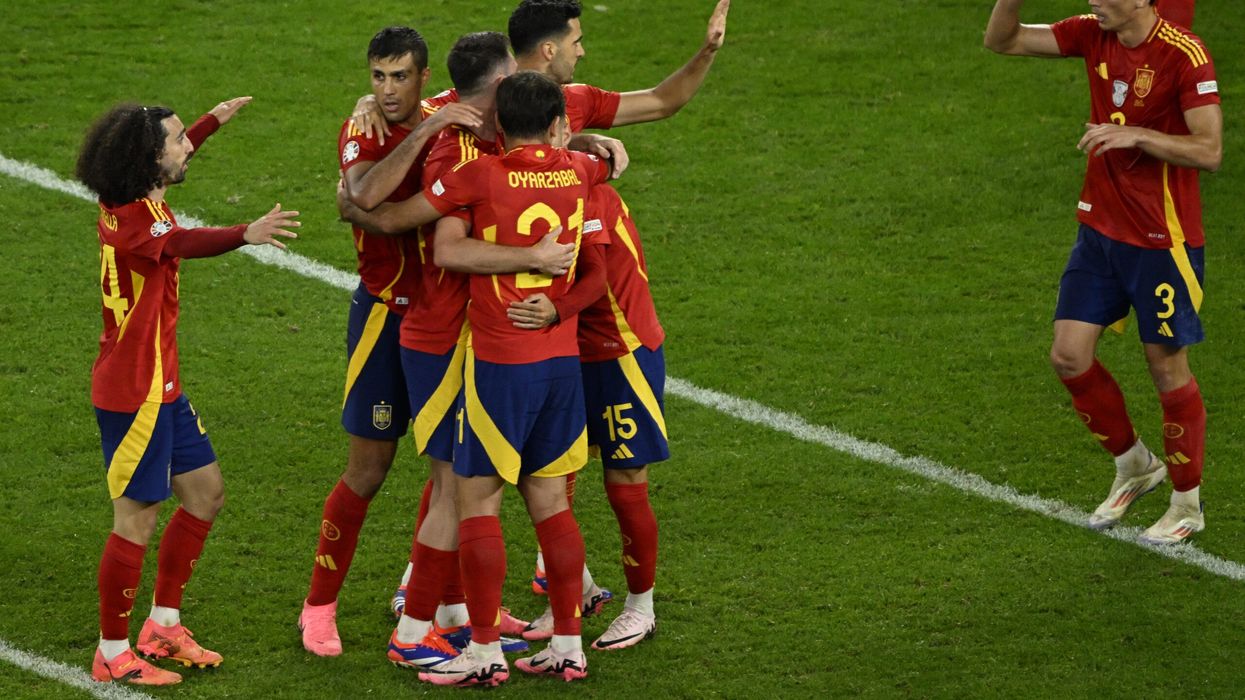 Spain beat Italy to reach Euro knockouts, England held by Denmark