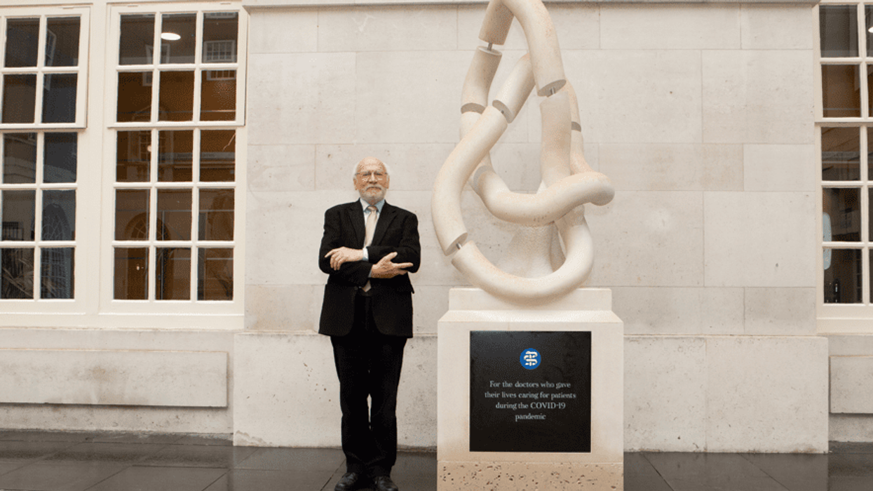 ‘This has been an invisible war,’ says son whose doctor father died of Covid