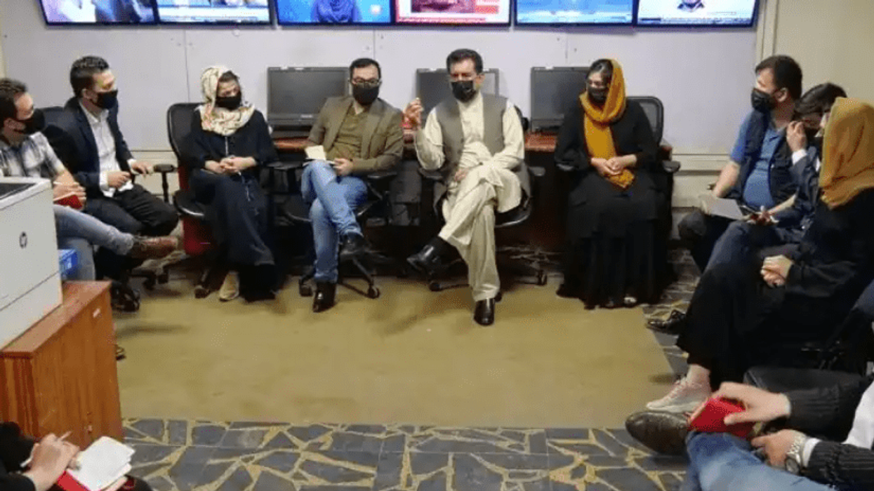 Afghan male news presenters wear masks on Air in protest over Taliban's draconian decree for female news anchor