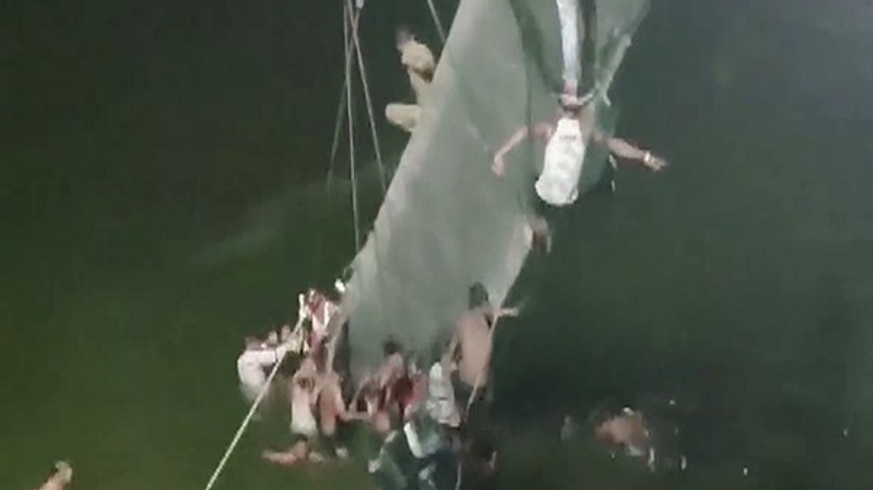 India: Over 60 dead after cable bridge collapses in Gujarat's Morbi