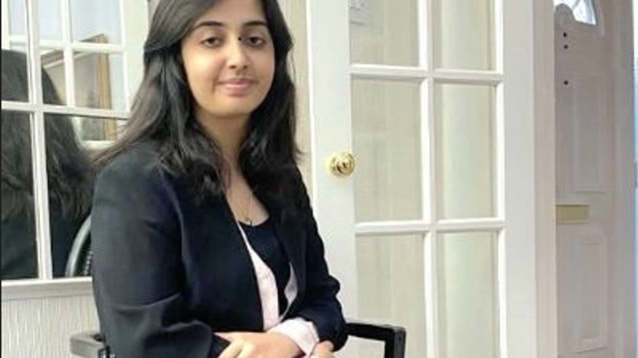 Asian student with high-IQ achieves four A*s