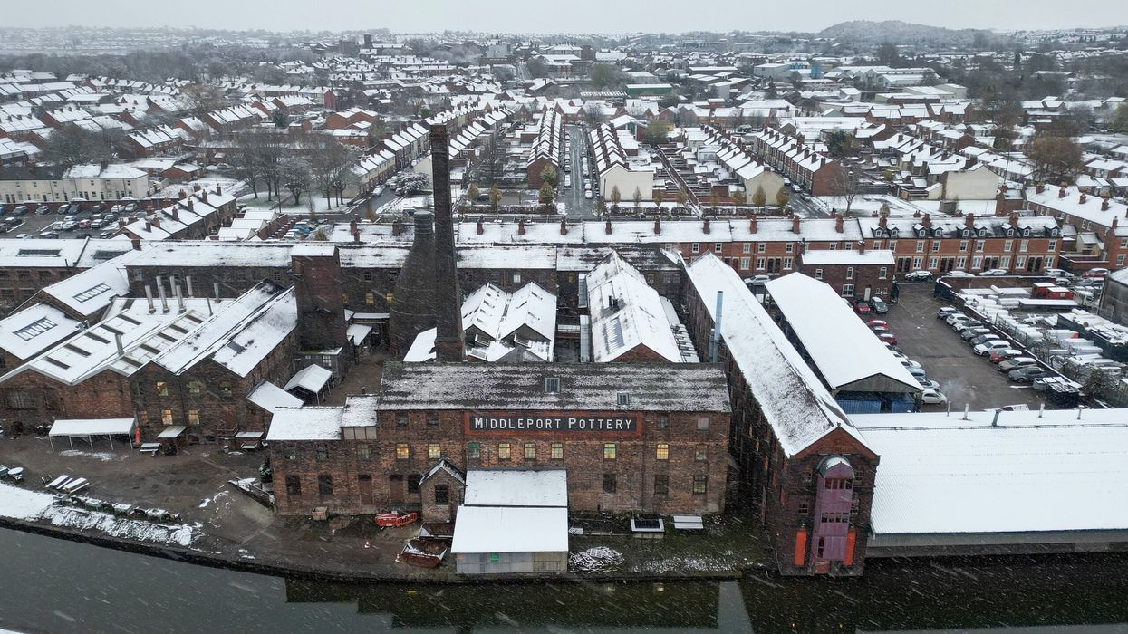 In this aerial view snow falls over homes in Middleport on November 19, 2024 in Stoke On Trent. (Photo: Getty Images)