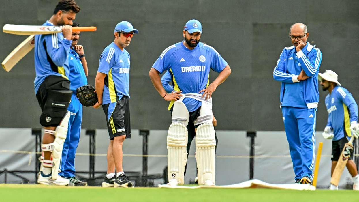 India's head coach Gautam Gambhir and captain Rohit Sharma inspect the pitch during a practice session ahead of their first Test cricket match against New Zealand at the M Chinnaswamy Stadium in Bengaluru on October 14. (Photo: Getty Images)