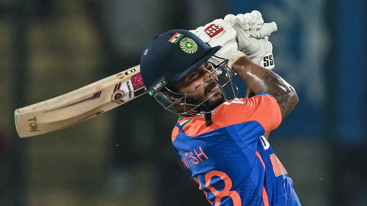 India's Nitish Kumar Reddy plays a shot during the second T20I against Bangladesh in New Delhi on October 9, 2024. (Photo: Getty Images)