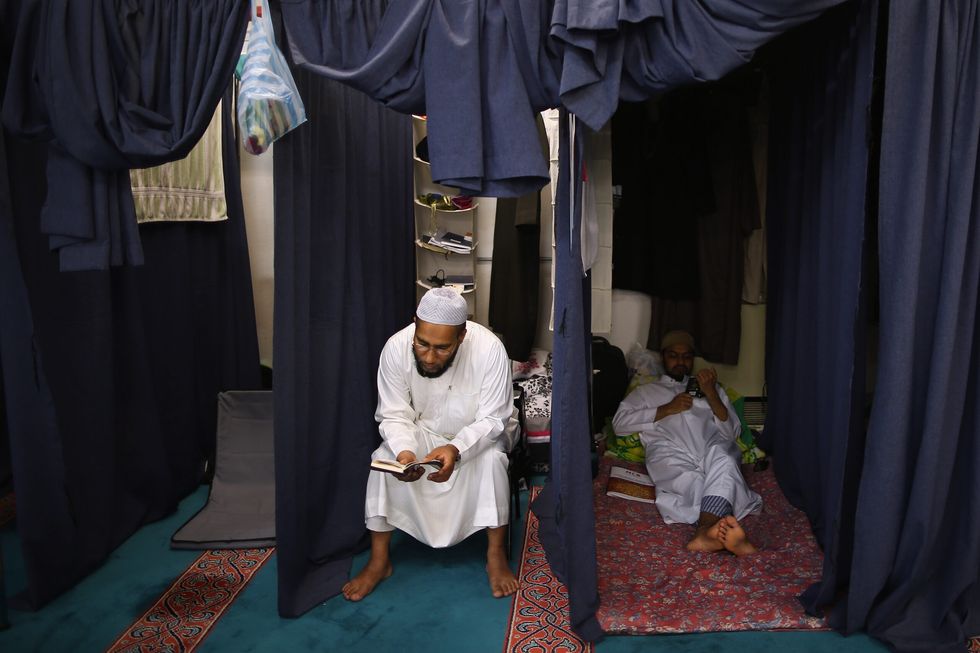 INSET 1A Men in itikaf GettyImages 175779061