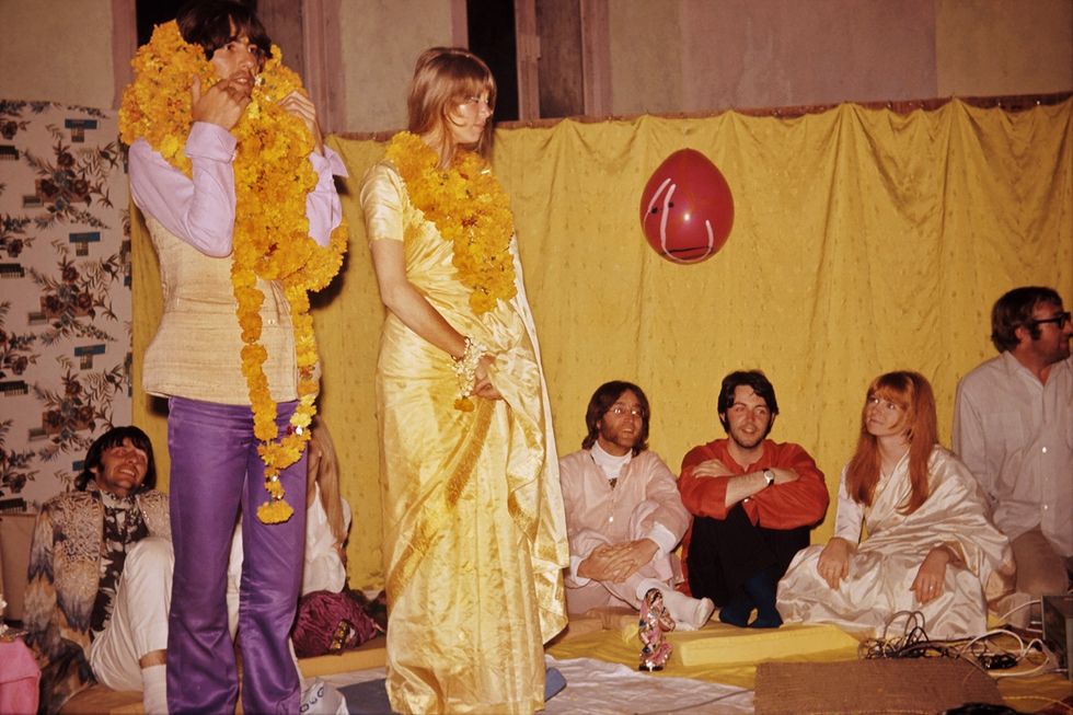 INSET 2 Beatles in India George Patti with garlands 22 November 2021