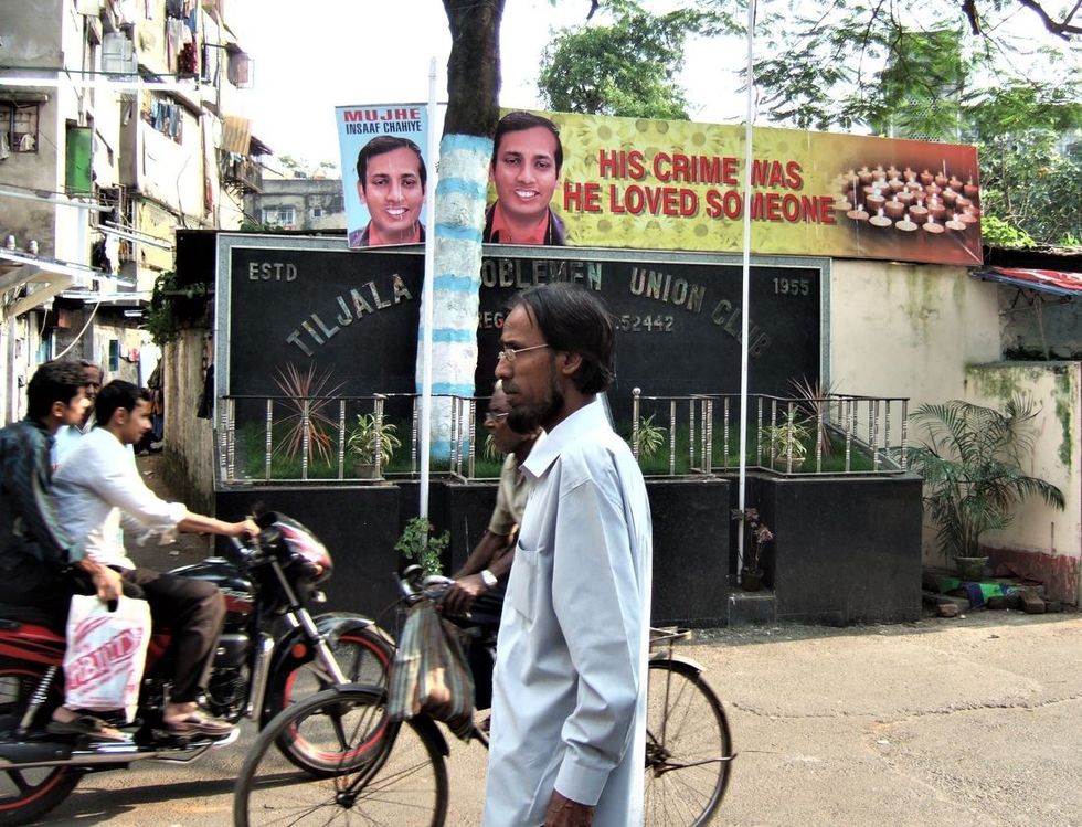 INSET 2 Rizwanur Rahman poster where he lived in Calcutta in 2007