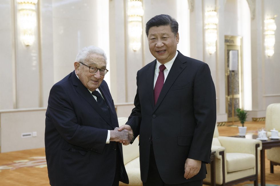 INSET 2 with Xi Jinping GettyImages 1059035978